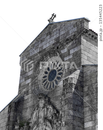 Historic church facade in Guimaraes, Portugal with prominent rose window and cross on top. Stone Historic church facade in Guimaraes, Portugal with prominent rose window and cross on top. Stone 135445223