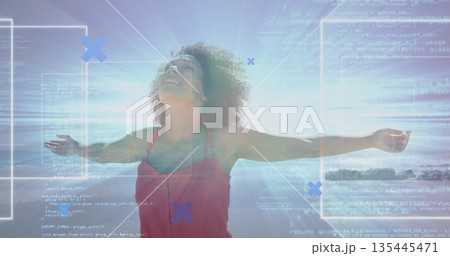 Standing woman in red sleeveless dress at beach shore, with arms outstretched and code UI overlays Standing woman in red sleeveless dress at beach shore, with arms outstretched and code UI overlays 135445471