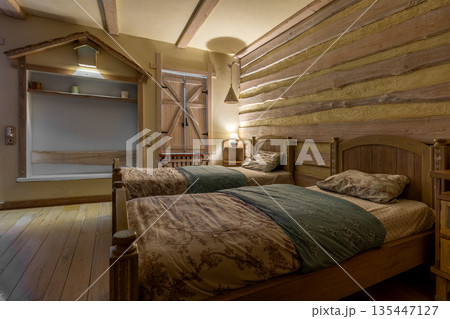 Rustic farmhouse bedroom with log walls and house-shaped shelves Rustic farmhouse bedroom with log walls and house-shaped shelves 135447127