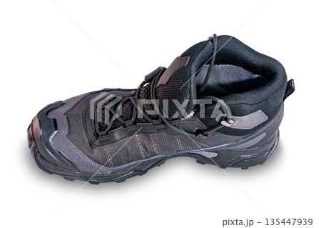Closeup view of right side hikink shoe with shoelace isolated on white background. Closeup view of right side hikink shoe with shoelace isolated on white background. 135447939