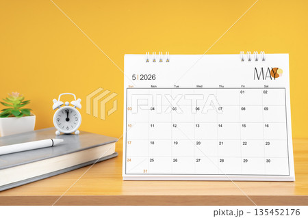 May desk calendar for 2026 year on work table. 135452176