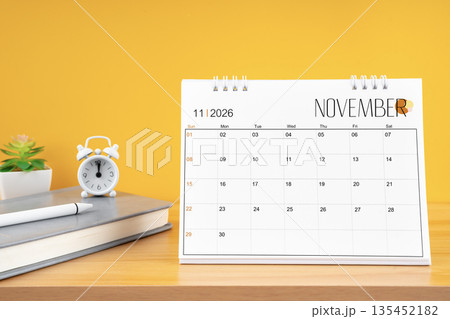 November desk calendar for 2026 year on work table. 135452182