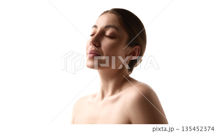 Female portrait with closed eyes and bare shoulders. 135452374