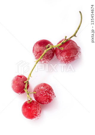 Branch Frozen red currants on a white background 135454674
