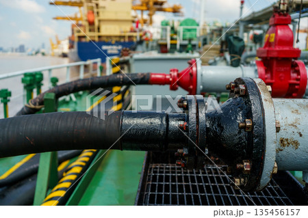 Industrial pipeline and hose system on offshore vessel deck. Industrial pipeline and hose system on offshore vessel deck. 135456157