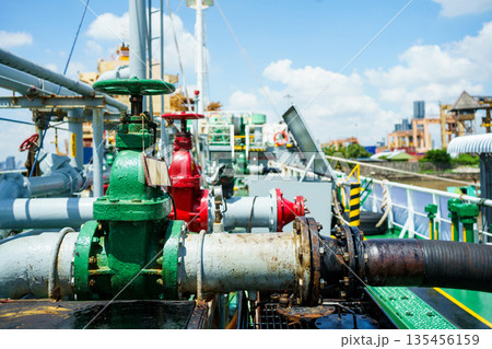 Industrial pipeline and hose system on offshore vessel deck. 135456159