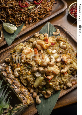 Thai chicken fried rice with pineapple and cashew on modrn bangkok restaurant table in thailand Thai chicken fried rice with pineapple and cashew on modrn bangkok restaurant table in thailand 135456665