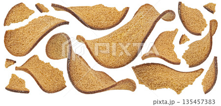 Thin rye bread croutons isolated on white background with clipping path, full depth of field 135457383