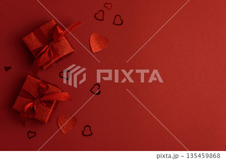 Red Glitter Gift Boxes and Hearts on Festive Background for Valentine's Day Celebration Red Glitter Gift Boxes and Hearts on Festive Background for Valentine's Day Celebration 135459868
