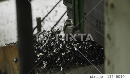 Metal shavings accumulating during industrial milling process. Stock clip Metal shavings accumulating during industrial milling process. Stock clip 135460304