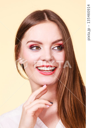 Smiling attractive woman with full makeup Smiling attractive woman with full makeup 135460914