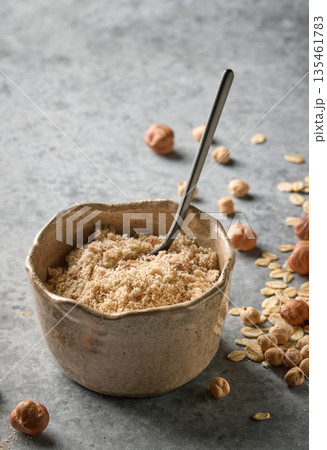 bowl of plant based protein powder bowl of plant based protein powder 135461783