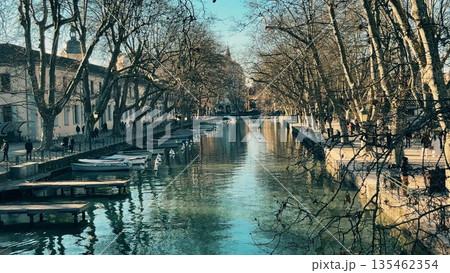Canal With Clear Water and Boats in Annecy Old Town on Winter Day, France 135462354