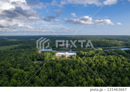 A lush green forest with a large building in the middle. Richmond, USA 135463667
