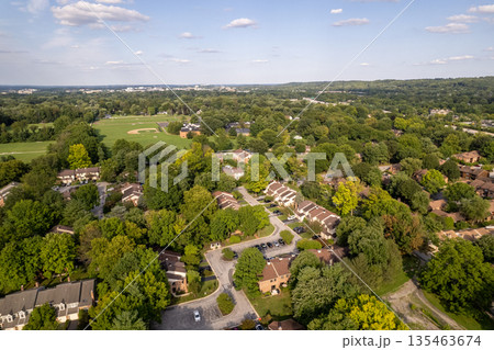 A view of a residential neighborhood with houses and trees. Chesterbrook, USA 135463674