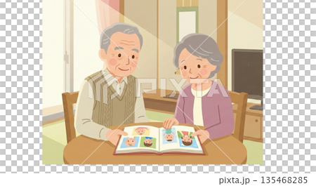 一對夫婦對著孫子的照片微笑 135468285