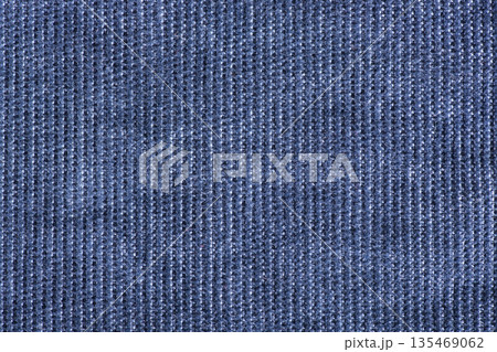 Background of denim corduroy fabric closeup 135469062