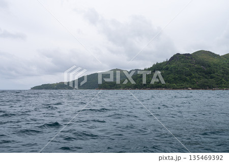 Sailing on a boat around Seychelles island in January 135469392
