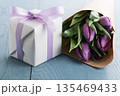 purple tulip with gift box on blue wood background 135469433
