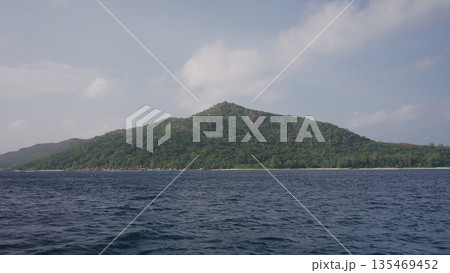 Sailing on a boat around Seychelles island in January 135469452