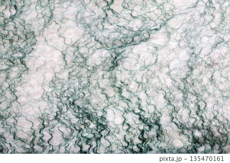Background from natural merino wool felted closeup 135470161