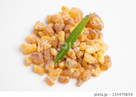 Frankincense or olibanum aromatic resin isolated on white background used in incense and perfumes. 135470659