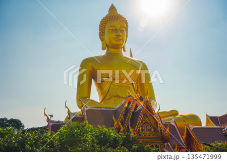 asia travel with large buddhist and beautiful temple with river at Bangkok Thailand in summer season 135471999