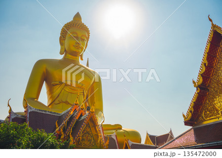 asia travel with large buddhist and beautiful temple with river at Bangkok Thailand in summer season 135472000