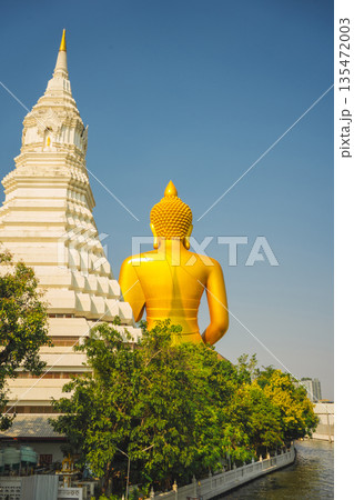 asia travel with large buddhist and beautiful temple with river at Bangkok Thailand in summer season 135472003