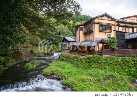 Cascading river by ryokan hotel in Kurokawa onsen, Kumamoto 135472563
