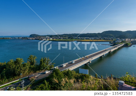 Aerial view of bridge across sea and city from Kitsuki castle, Oita 135472583