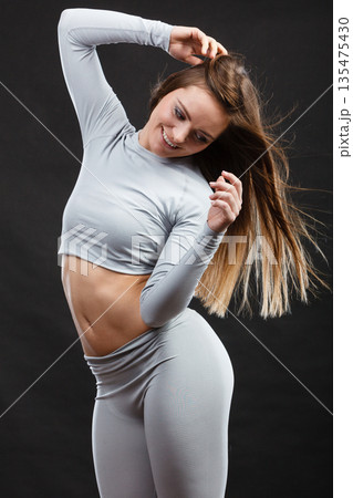 Sport fit woman in thermal clothes. 135475430