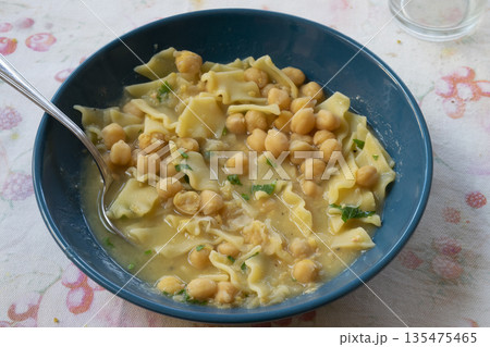 pasta with soup of chickpeas 135475465