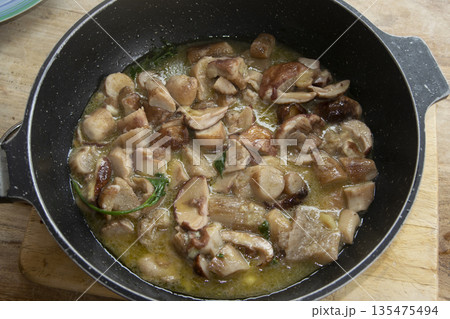 creamy porcini mushroom sauce in pan creamy porcini mushroom sauce in pan 135475494