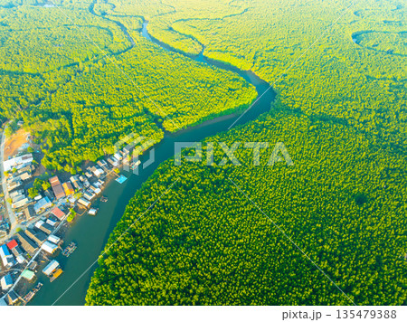 Aerial view top view of the fisherman village with fishing boats and house roof at the pier in Phangnga Thailand, Panorama high angle view Aerial view top view of the fisherman village with fishing boats and house roof at the pier in Phangnga Thailand, Panorama high angle view 135479388