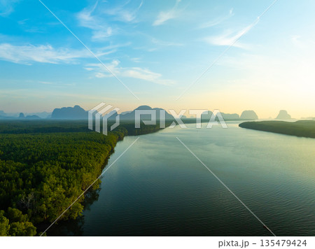 Aerial view sunset sky,Nature beautiful light Sunset or sunrise over sea,Colorful scenery sunset sky background,Amazing clouds and waves in sunrise sky nature light cloud background 135479424