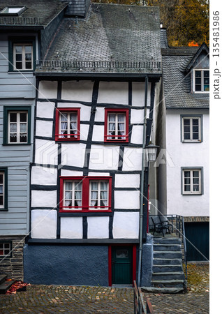 Picturesque Town Monschau with Historical Charm and the Tranquil Rur River in autumn 135481986
