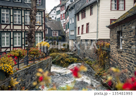 Picturesque Town Monschau with Historical Charm and the Tranquil Rur River in autumn 135481993