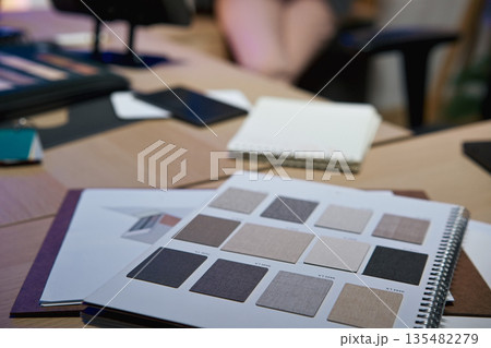 Interior designers working table at night time Interior designers working table at night time 135482279