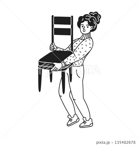 Girl Holding a Chair with Both Hands 135482678