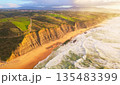 Magoito Beach and Cliffs at Sunset. Atlantic Ocean, Portugal. Aerial View 135483399