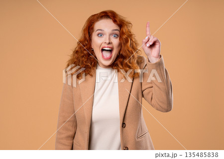 Breakthrough Genius Idea. Happy Ginger Businesswoman Eureka Moment, Pointing Finger Up 135485838