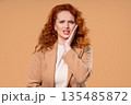 Young Businesswoman With Tooth Pain, Beige Background.toothache, Dental Problem  135485872