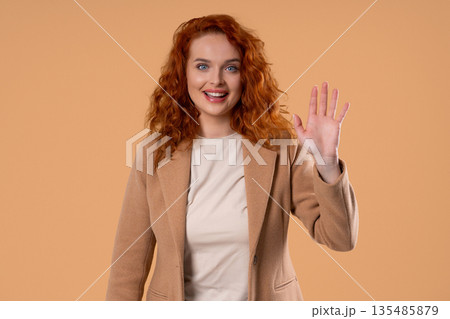 Friendly Young Ginger BusinessWoman Waving Hand - Hello, Or Salute, Chao 135485879