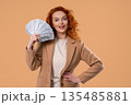 Rich Businesswoman With Usd Cash Money Dollars On Beige, Income Payment 135485881