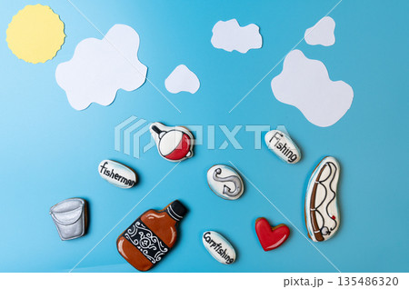 Cookies on a fishing theme. Fishing equipment. 135486320