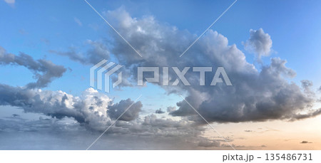 Beautiful blue sky with fluffy cumulus clouds 135486731