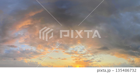 Colorful landscape with sky, sun and gold, red and dark clouds Colorful landscape with sky, sun and gold, red and dark clouds 135486732