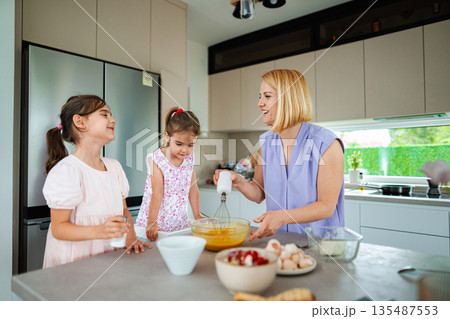 Baking memories in a sunny kitchen with family moments 135487553
