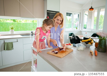 Baking memories in a sunny kitchen with a child 135487555
